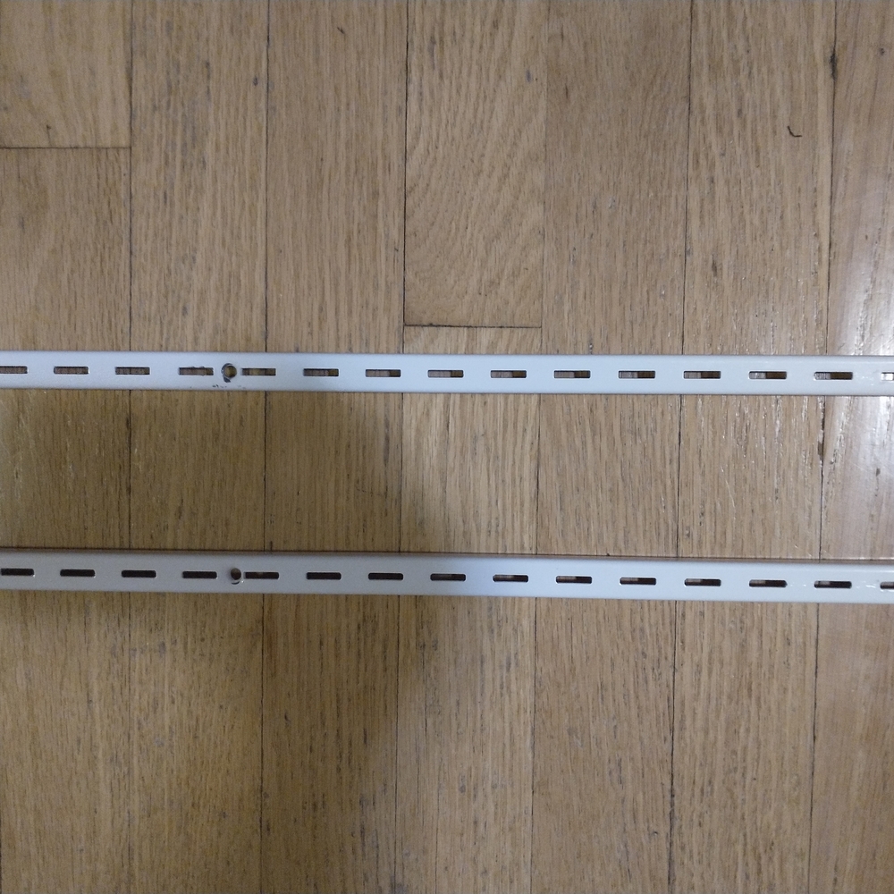 2 pcs Of 24 in. L - White Shelf Tracks Light Duty Vertical Rail, used, good cond